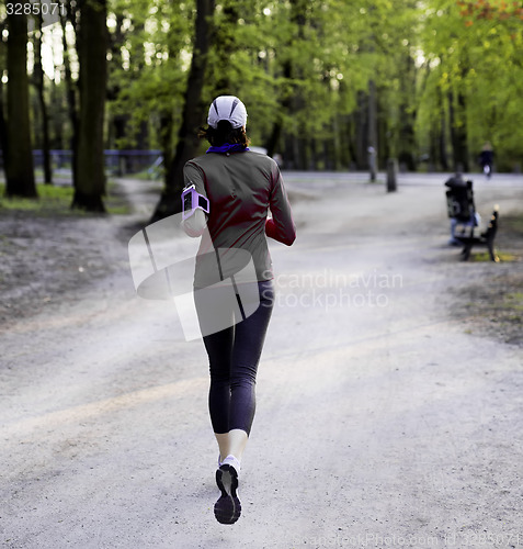 Image of Young female jogger