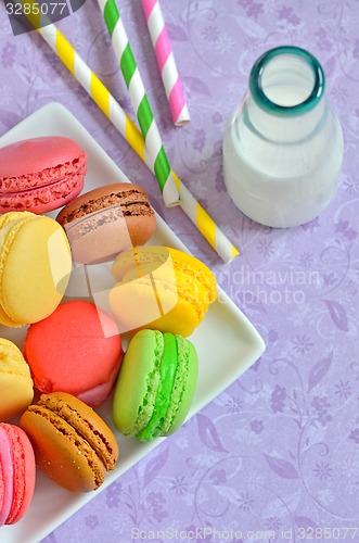 Image of color macaroons and milk 