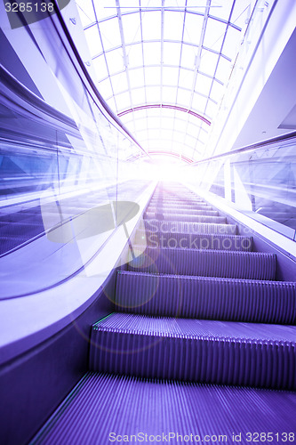 Image of blue steps of escalator