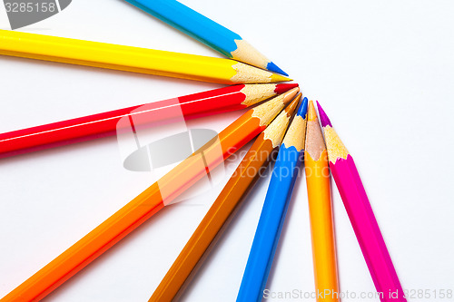 Image of set of colored pencils on white background