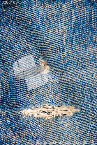 Image of jeans with a hole