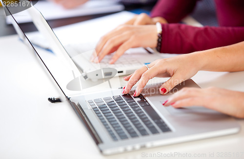 Image of Female hands on a keyboard