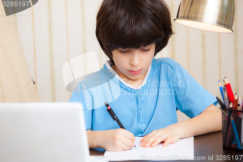 Image of child doing homework