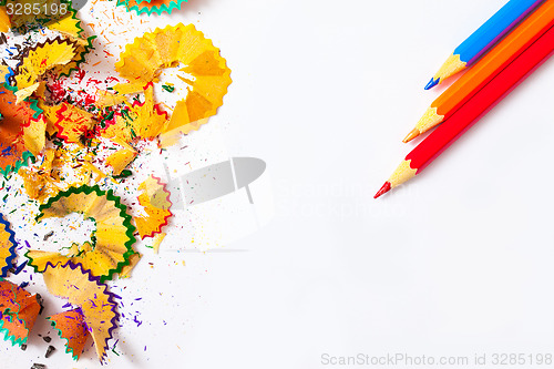 Image of colored shavings and pencils
