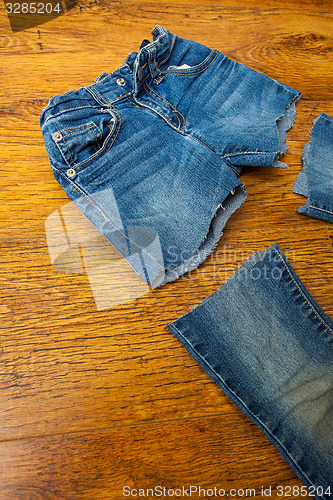 Image of cut old jeans