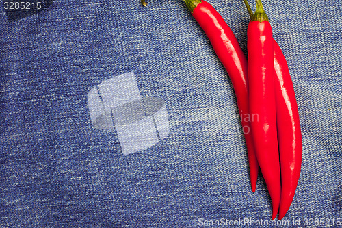 Image of chili pepper on jeans