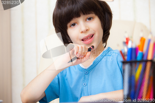 Image of Boy doing homework