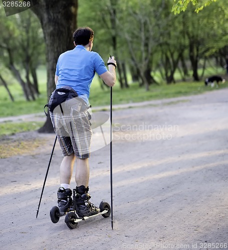 Image of Male roller skater in park