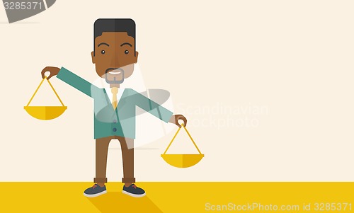 Image of Black man holding a weighing scale.