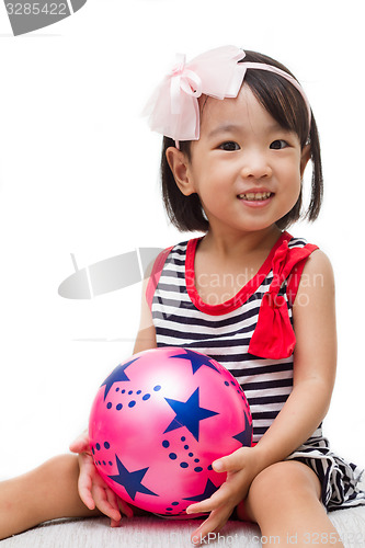 Image of Asian Chinese Girl Holding Ball