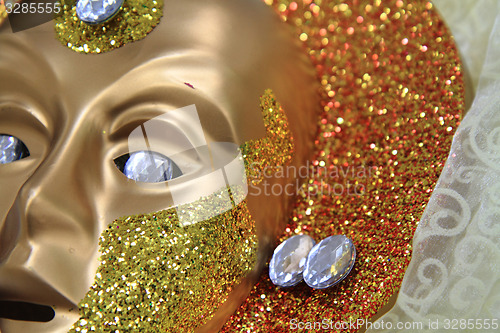 Image of golden venice mask as easy background