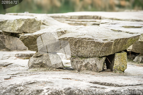 Image of natural stone bench in the park