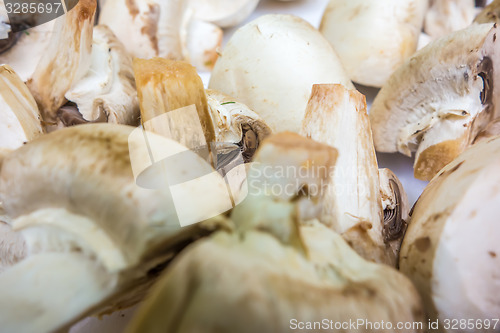 Image of raw sliced mushrooms ready for grilling