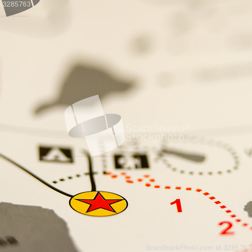 Image of you are here star symbol on hiking map