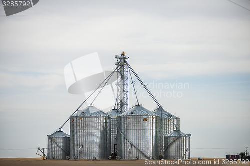 Image of spring farmland before sunset on a cloudy day