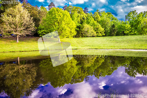 Image of beautiful landscape and reflections in water