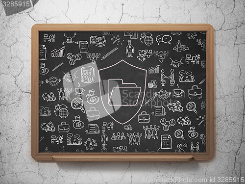 Image of Business concept: Folder With Shield on School Board background