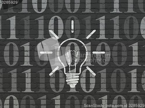 Image of Finance concept: Light Bulb on wall background