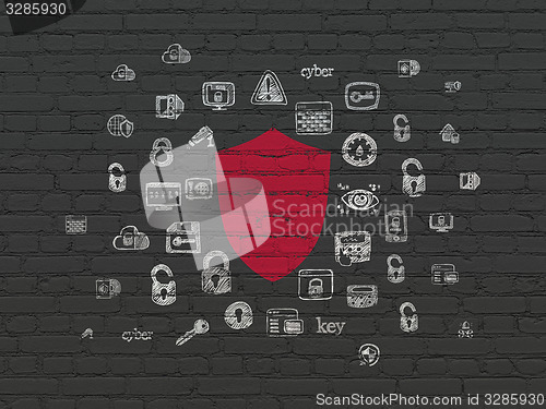 Image of Safety concept: Shield on wall background