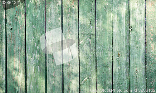 Image of green wooden wall