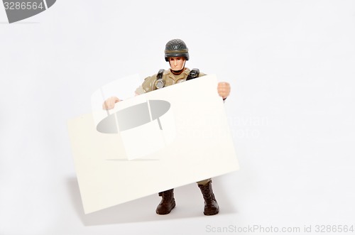 Image of Soldier holds a namecard