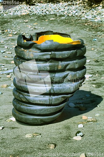 Image of plastic pollution garbage on the sand