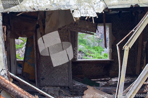 Image of Ruins of a house in the mountains is a symbol of desolation