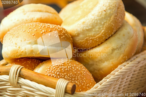 Image of Some bread with seeds in the basket