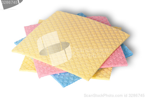 Image of Multicolored sponges for dishwashing in a chaotic order