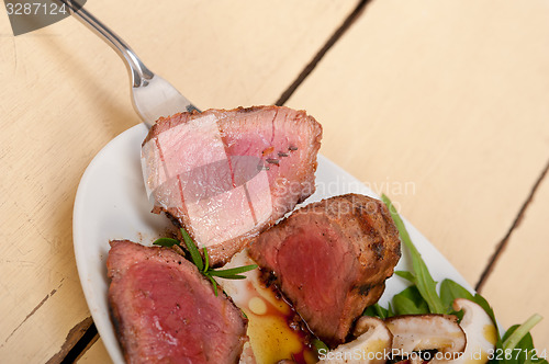 Image of beef filet mignon grilled with vegetables