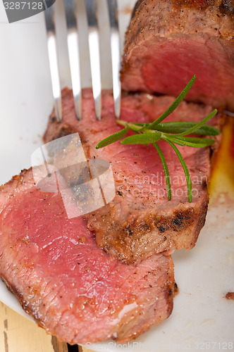 Image of beef filet mignon grilled with vegetables