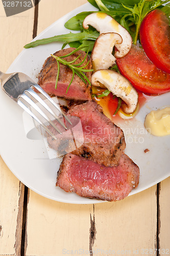 Image of beef filet mignon grilled with vegetables