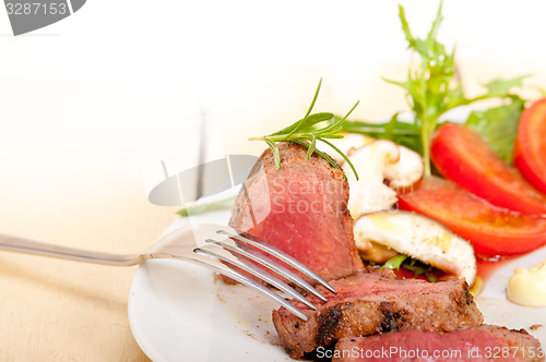 Image of beef filet mignon grilled with vegetables