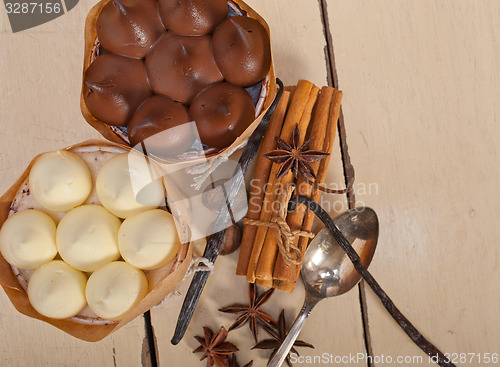 Image of chocolate vanilla and spices cream cake dessert 