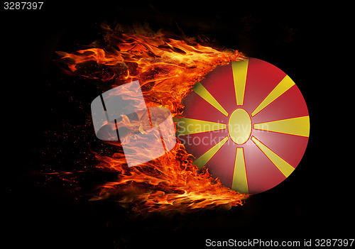 Image of Flag with a trail of fire - Macedonia