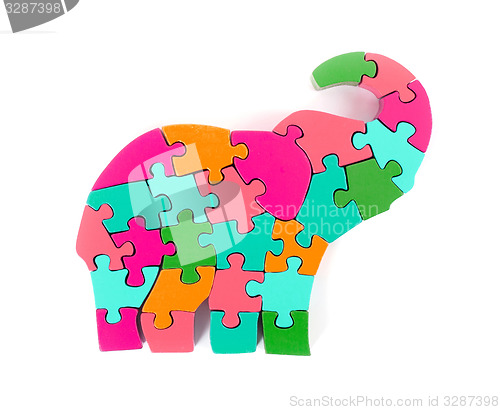 Image of Colorful puzzle pieces in elephant shape