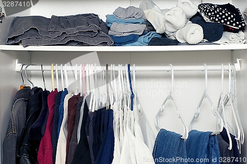 Image of inside wardrobe with shelf