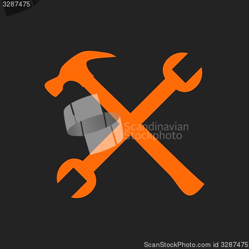Image of Crossed orange tools on black