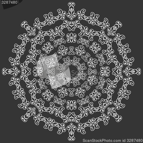 Image of Round ornate pattern on black background