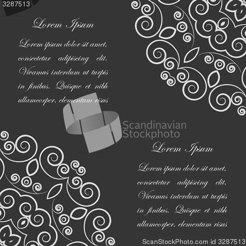 Image of Black background with white ornate pattern