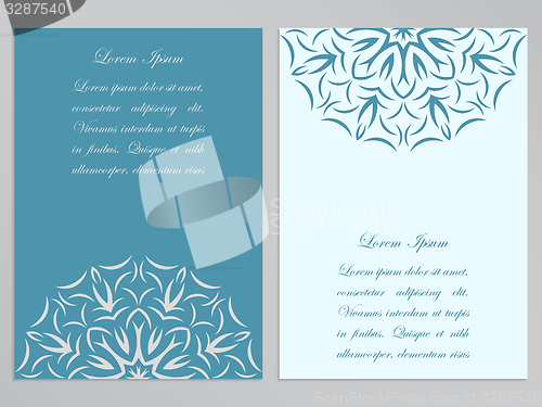 Image of Blue and white flyers with ornate flower pattern