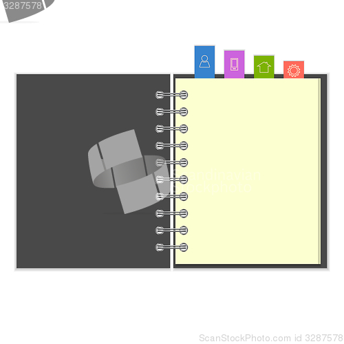 Image of Blank notebook with colorful information bookmarks