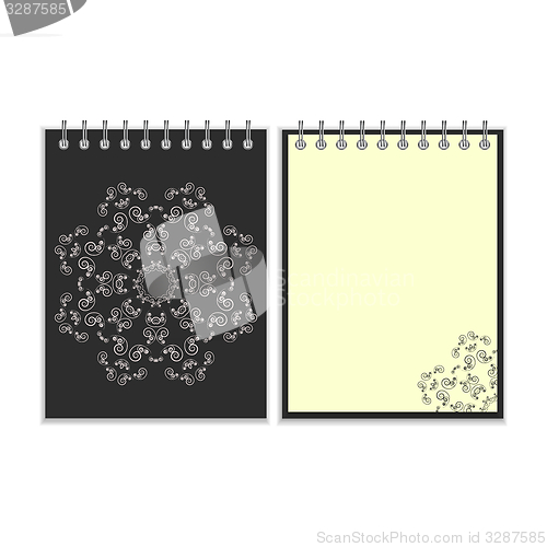 Image of Black cover notebook with round ornate star pattern