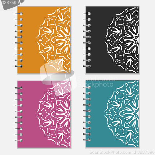 Image of Set of colorful notebook covers with flower design