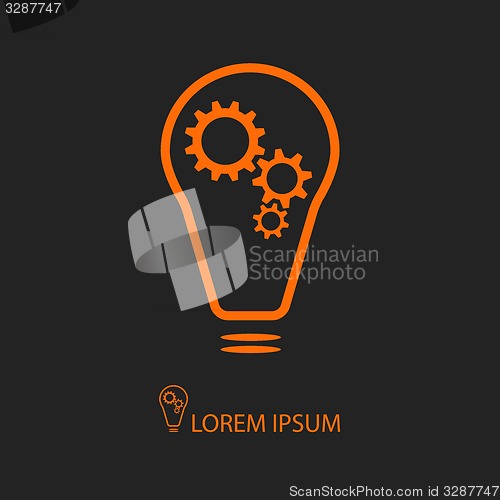 Image of Orange bulb with gearwheels on black