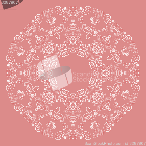 Image of Round lacy pattern on pink background