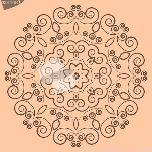 Image of Round lacy brown pattern on beige background