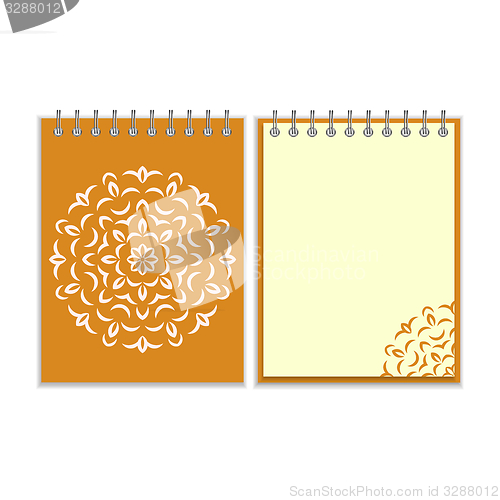 Image of Spiral orange cover notebook with round ornate pattern