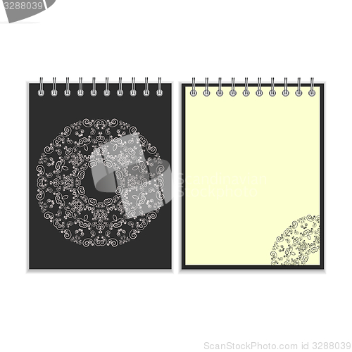 Image of Black cover notebook with round ornate pattern