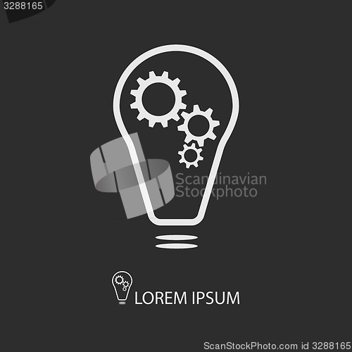 Image of White bulb with gearwheels on dark grey